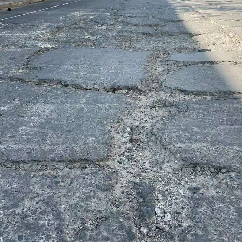 宁远路面起砂露石子修补料